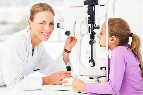 Child receiving eye exam
